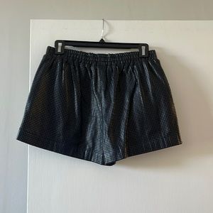 Perforated leather shorts